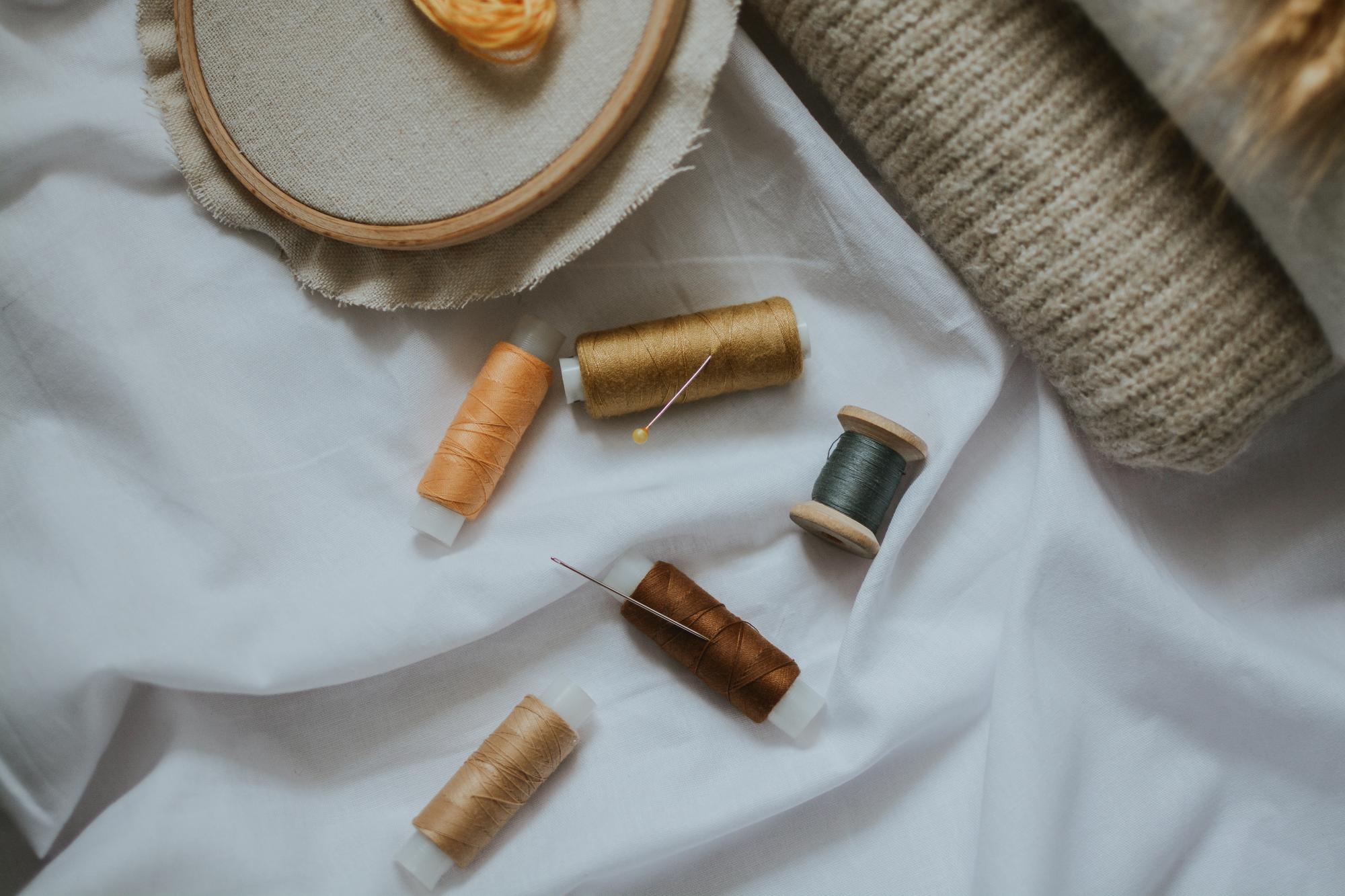 Thread spools in muted palette